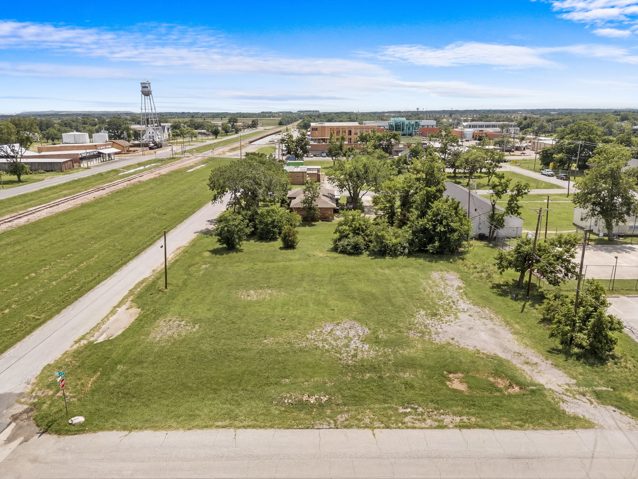 Aerial view showing downtown Anna corridor with historic water tower
